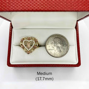 10k - 14k Gold ring with heart design next to a silver dollar bill in a red jewelry box.