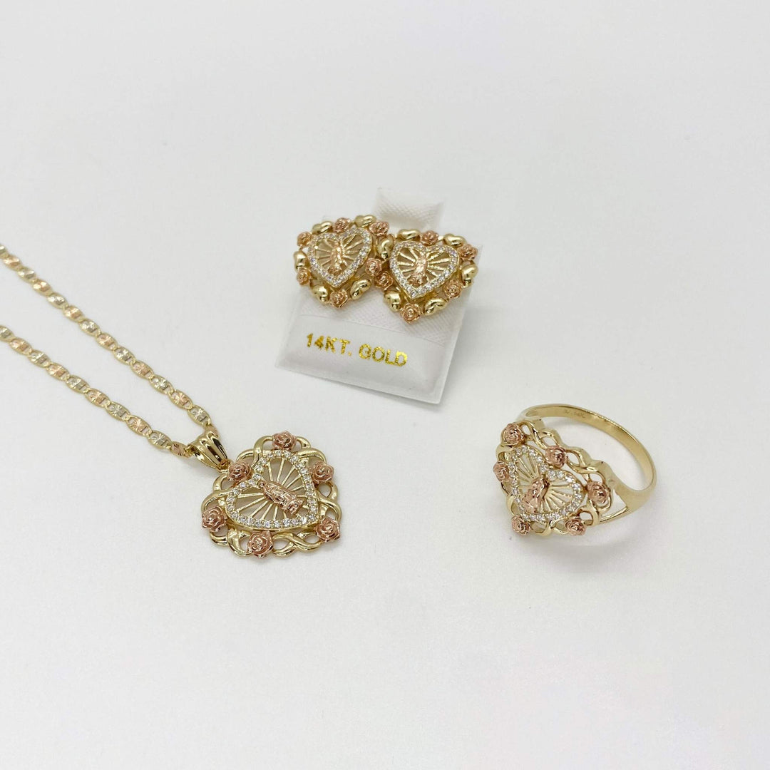 10k - 14k Gold jewelry set with necklace, earrings, and ring on a white background