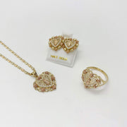 10k - 14k Gold jewelry set with necklace, earrings, and ring on a white background