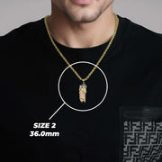 Model wearing the tri-color gold San Judas pendant with Size 2 (36.0mm) label.