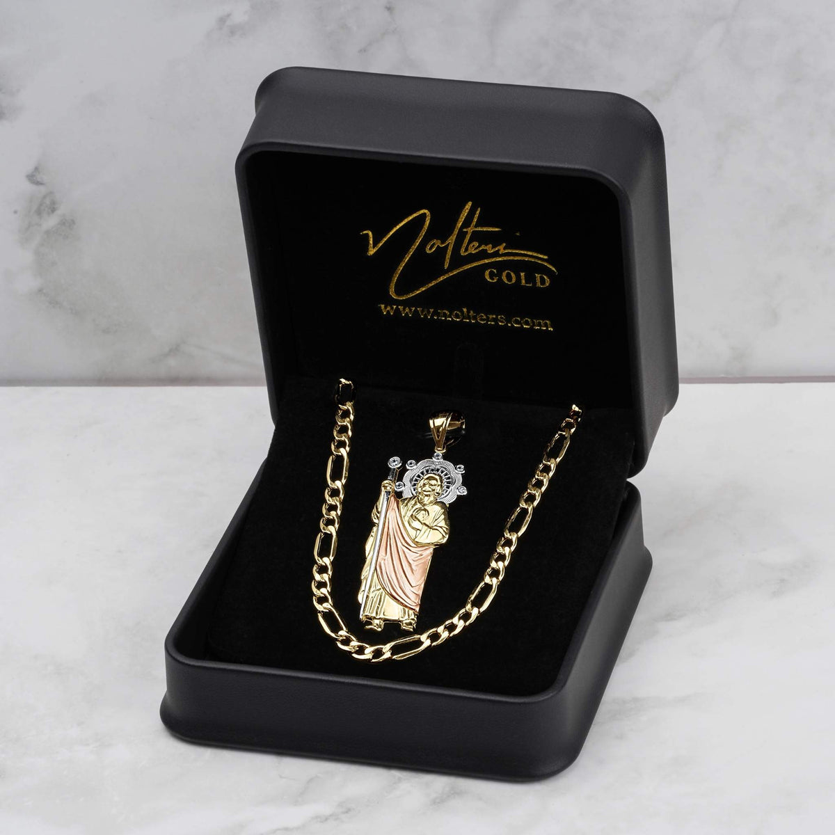 10k and 14k gold San Judas pendant and chain inside a black presentation box.