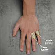 Hand wearing medium and large 10k gold rectangular Grim Reaper rings for size comparison.
