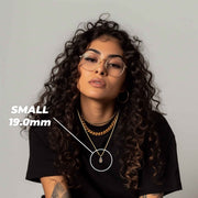 Small 19.0mm gold Guadalupe pendant necklace worn on model.