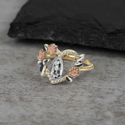 Yellow, rose, and white gold heart ring showcasing Our Lady of Guadalupe