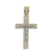 Front view of two-tone gold Hermo iced crucifix pendant with white gold Jesus figure isolated on white background.