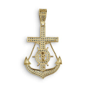 Reverse view of gold anchor crucifix pendant showing solid back structure and textured design.