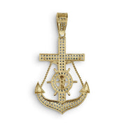 Reverse view of a gold anchor and cross pendant paved with sparkling cubic zirconia.