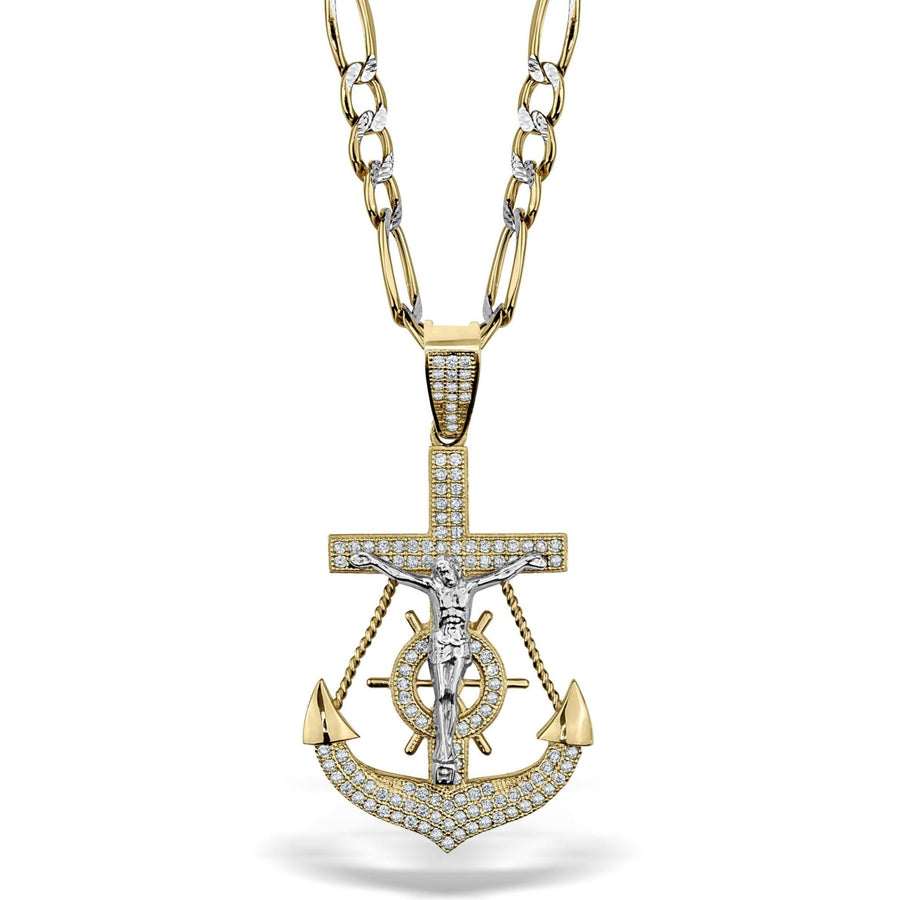Two-tone gold crucifix and anchor pendant paved with sparkling cubic zirconia stones.