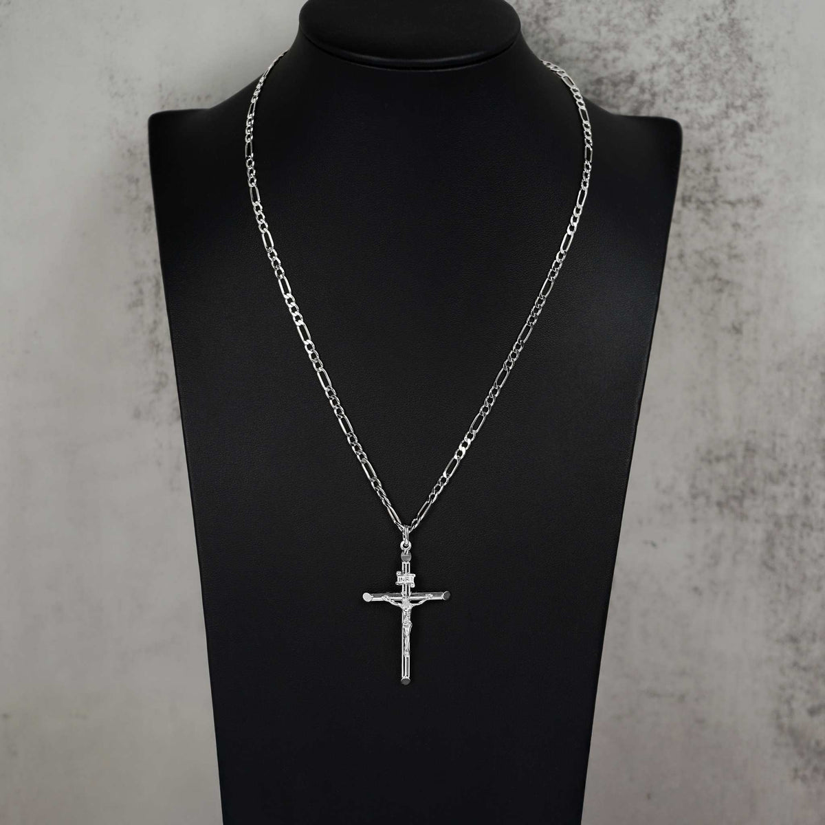 14k white gold classic tube INRI cross necklace displayed on a black jewelry stand.