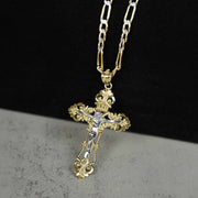 Front view of a two-tone 10k or 14k gold and rose gold INRI crucifix pendant paired with a Figaro chain on a display stand.