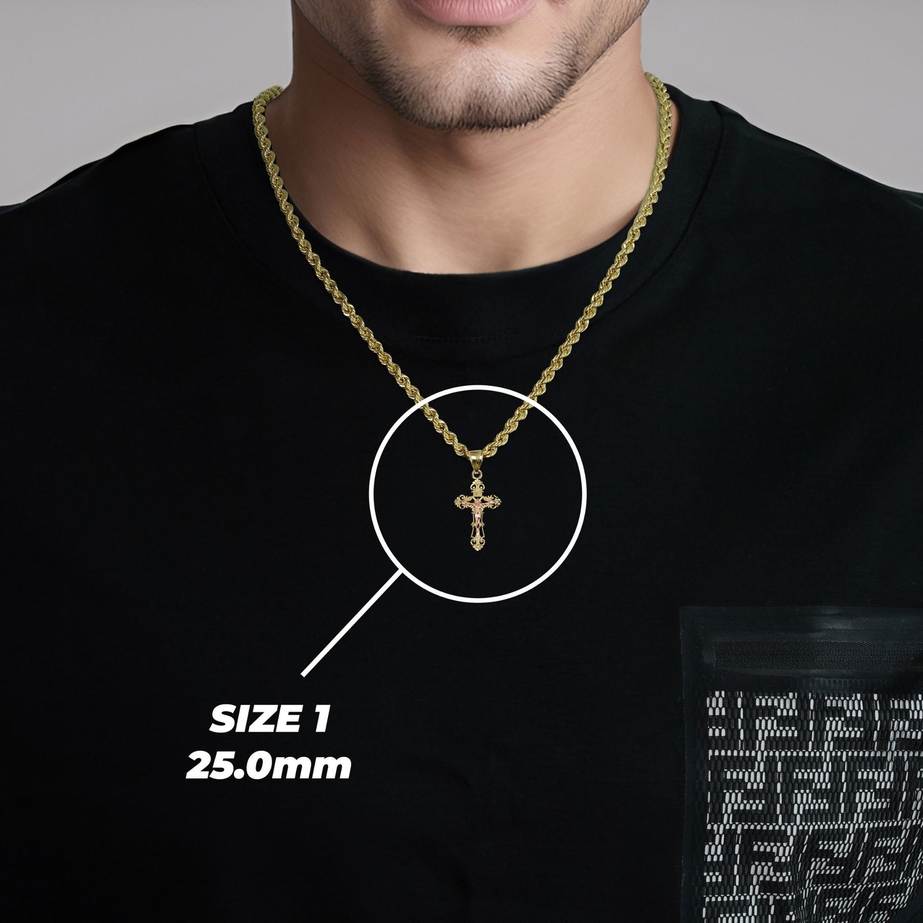 Man wearing the Size 1 (25.0mm) gold cross pendant necklace with size overlay.