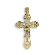 Plain, smooth back surface of the two-tone crucifix pendant, highlighting the solid bail.