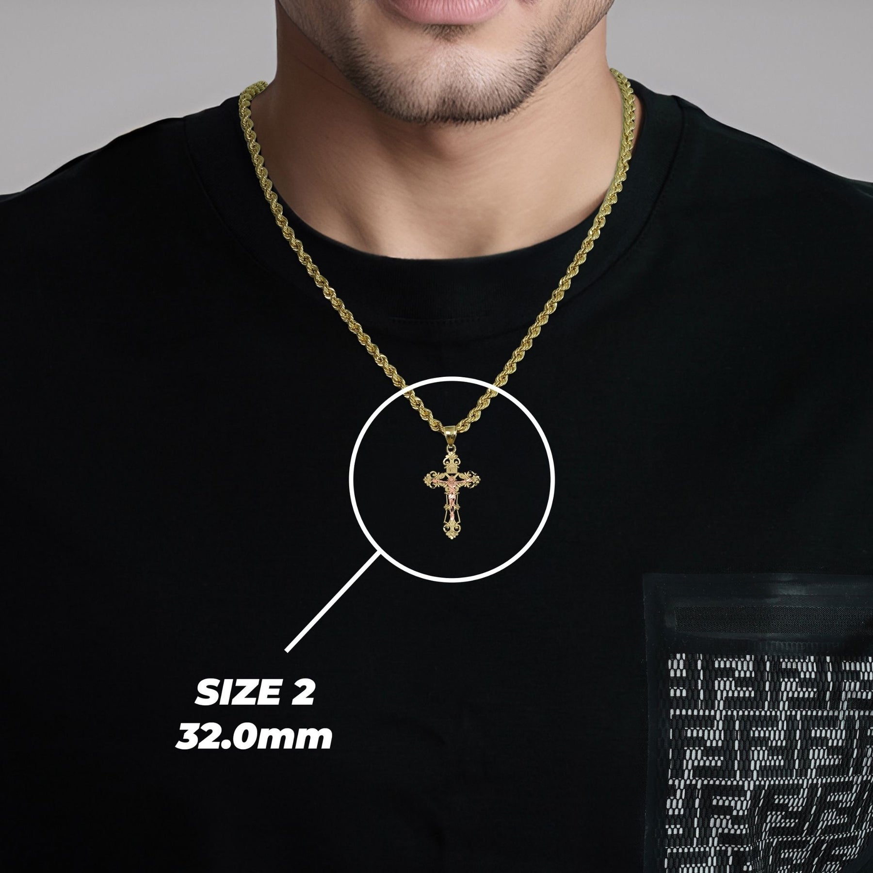 Man wearing the Size 2 (32.0mm) gold cross pendant necklace with size overlay.