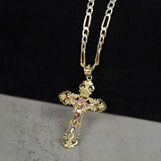 Product view of the two-tone crucifix pendant showcasing the INRI inscription and detailed corpus.