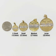 Four Last Supper gold pendant sizes compared to a quarter coin on white background.