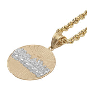 Gold round Last Supper pendant necklace with a detailed relief and rope chain.