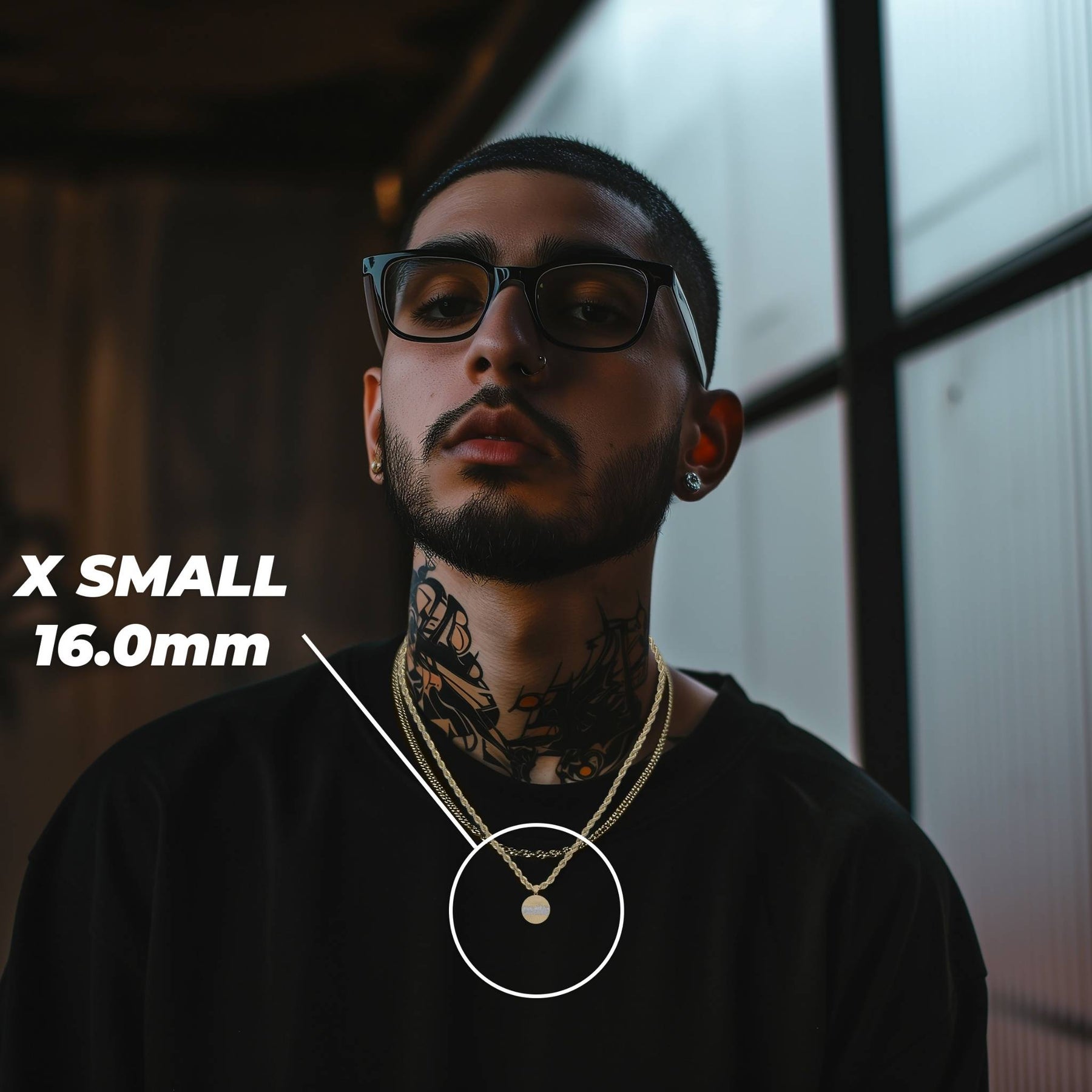Man wearing the X-Small 16.0mm gold Last Supper pendant necklace.