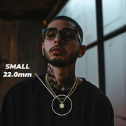 Man wearing the Small 22.0mm gold Last Supper pendant necklace.