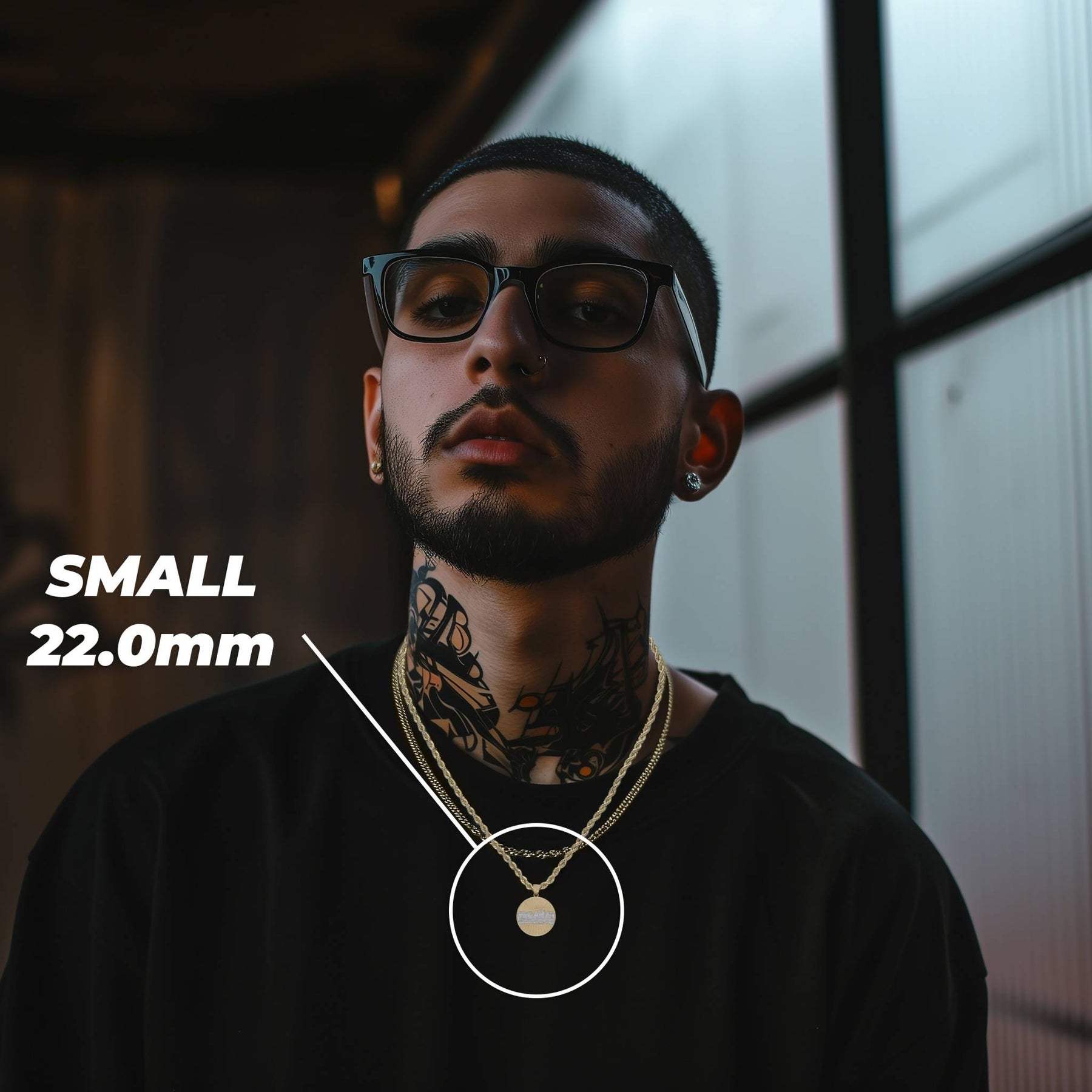Man wearing the Small 22.0mm gold Last Supper pendant necklace.