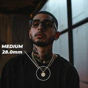 Man wearing the Medium 28.0mm gold Last Supper pendant necklace.
