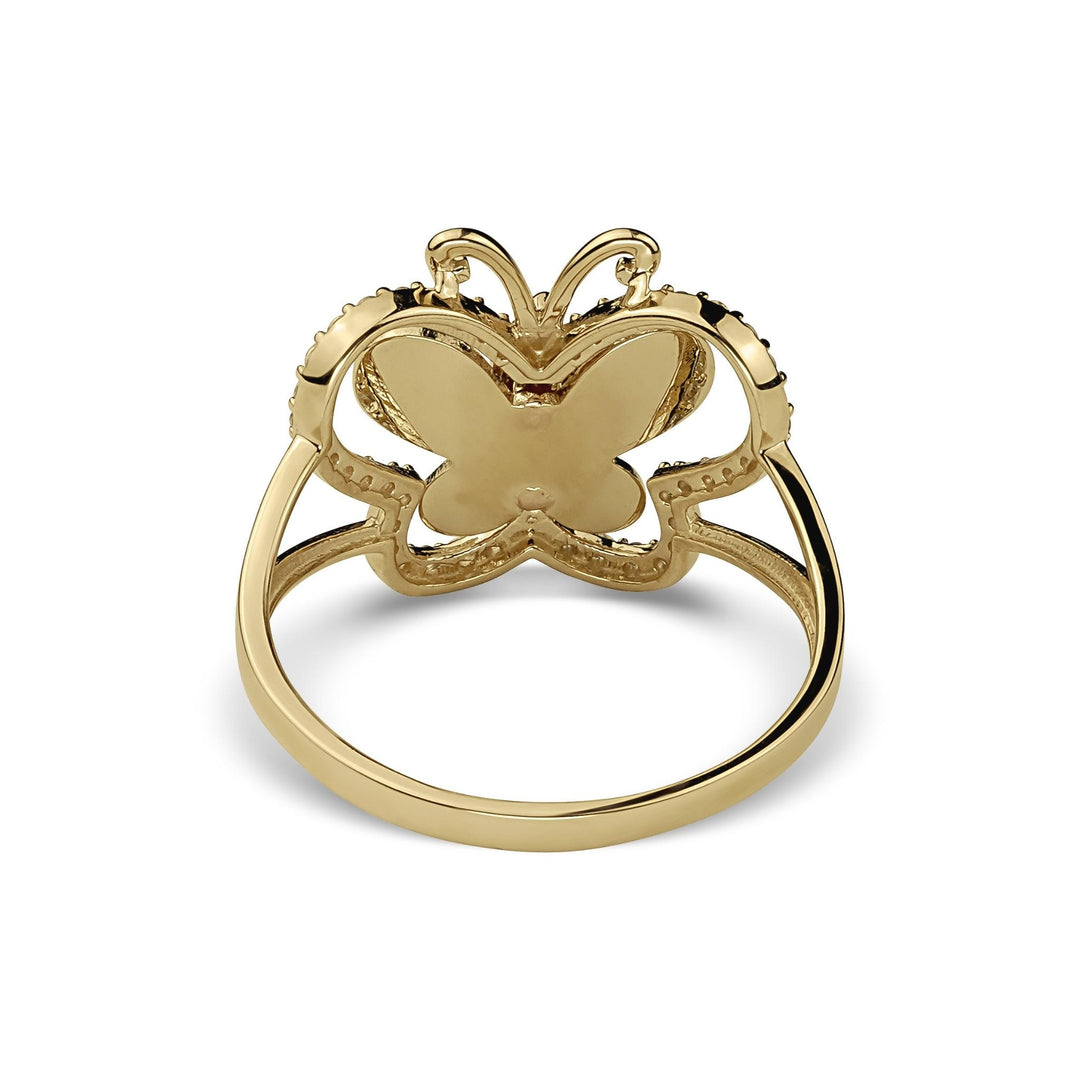 Underside view of 14k gold Leir Virgin Mary Guadalupe butterfly ring on white.