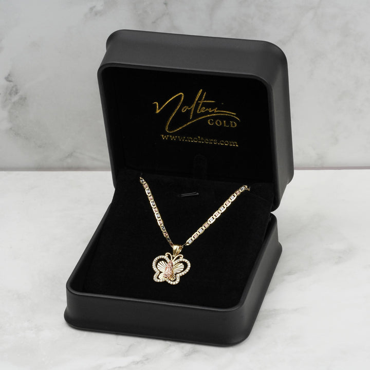 A model wearing a gold butterfly pendant necklace with a size 3 callout.