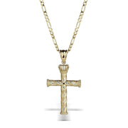 Gold cross pendant with crown detail and Greek key pattern on a Figaro chain.