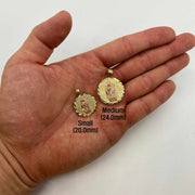 10k & 14k gold Luna Guadalupe rose two-tone round pendant size comparison held in hand.