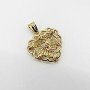 Back view of gold filigree Virgin Mary heart pendant with textured mesh details.
