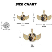 Size chart comparing three round CZ angel wing picture pendants with a coin scale.