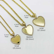 Small, Medium, and Large gold heart CZ memorial pendants paired with 3.2mm and 4.3mm rope chains.