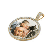 Gold custom photo pendant with a crystal halo and a family portrait.