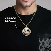 Man wearing a gold chain necklace with an extra-large 50.0mm round memorial pendant featuring a custom photo.