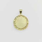 Round gold pendant with a textured crosshatch center and classic nugget-style border.
