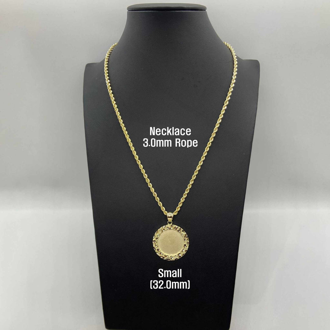 Small 32mm gold nugget pendant on a 3.0mm rope chain displayed on black stand.