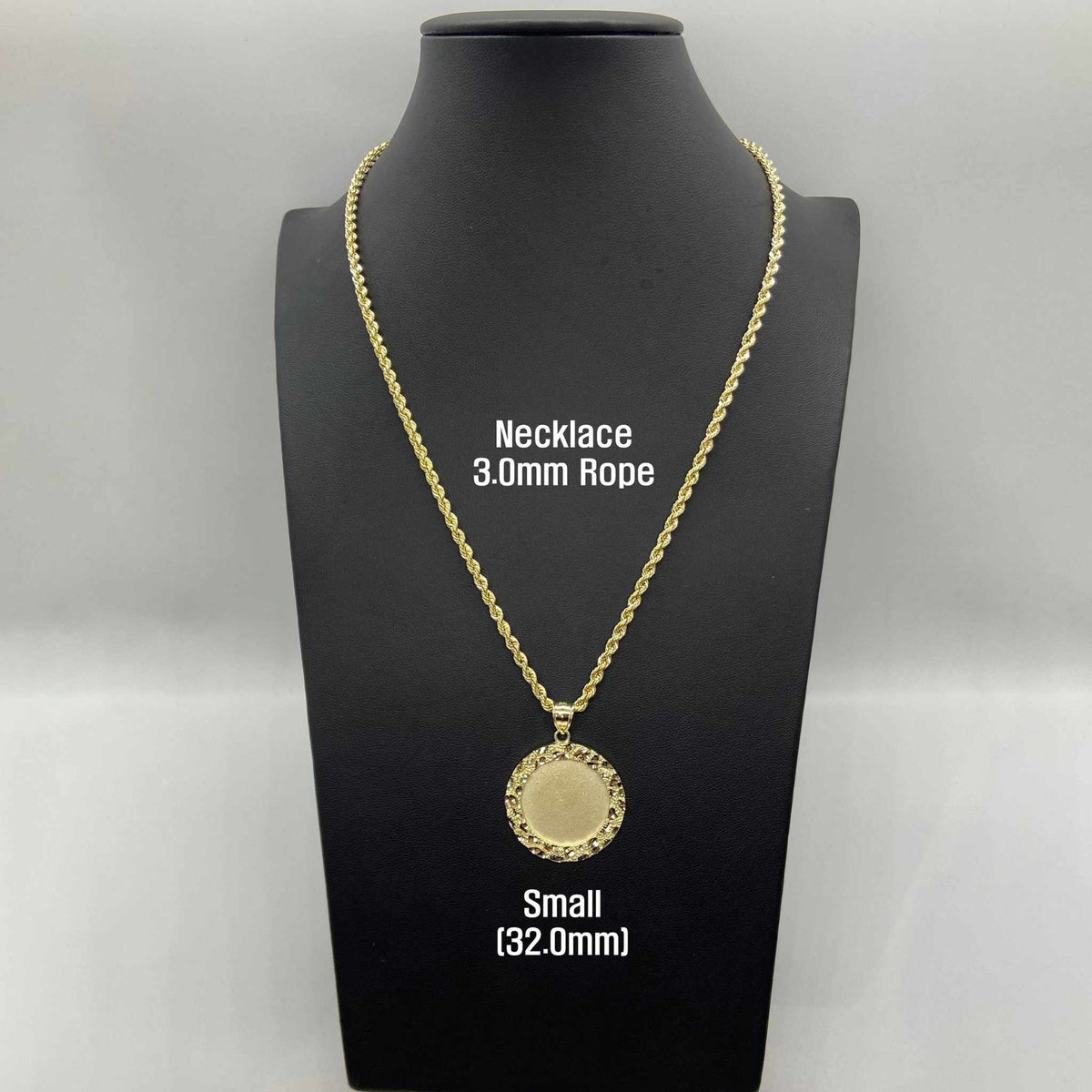 Small 32mm gold nugget pendant on a 3.0mm rope chain displayed on black stand.