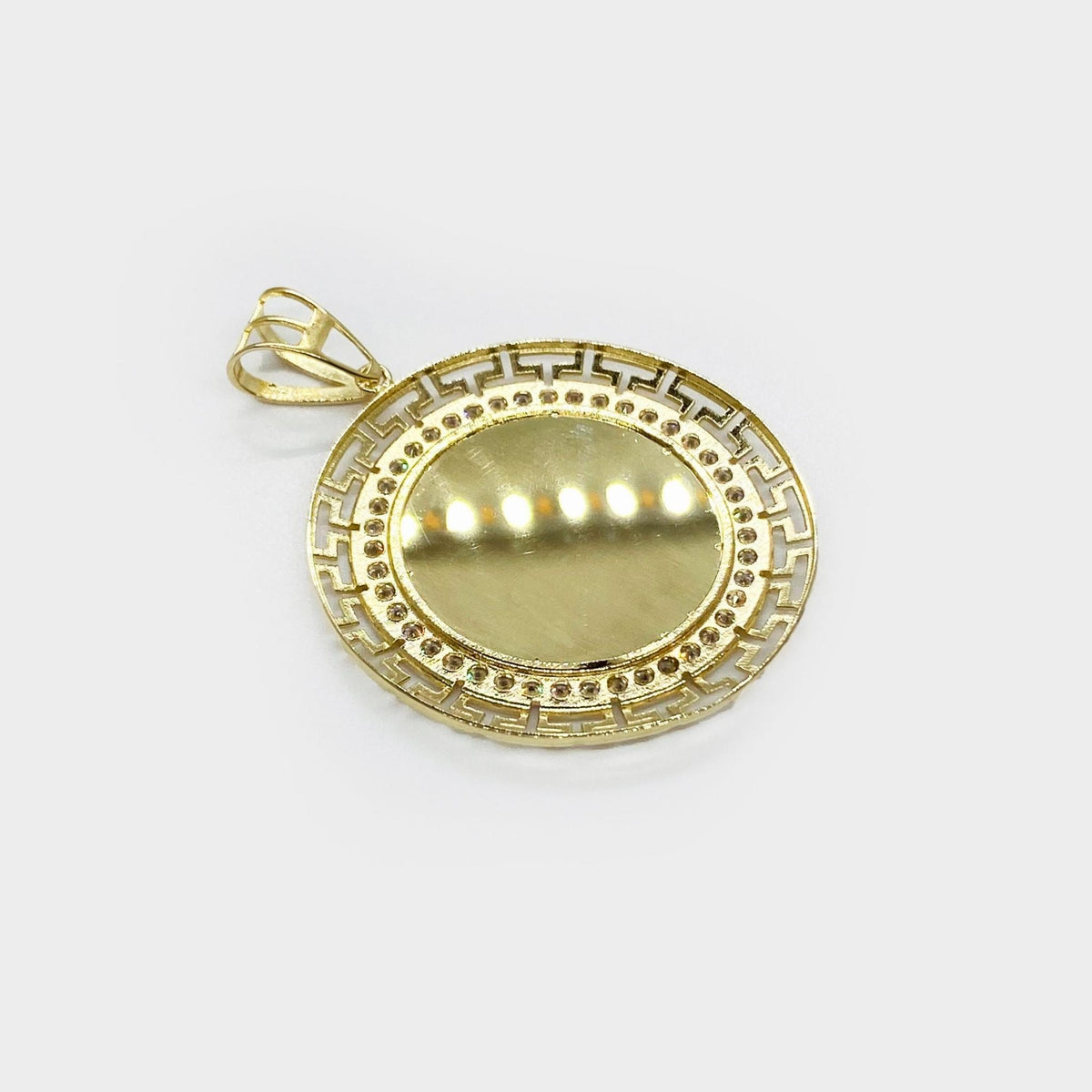 Front angled close-up of a round gold memorial picture frame pendant with cubic zirconia