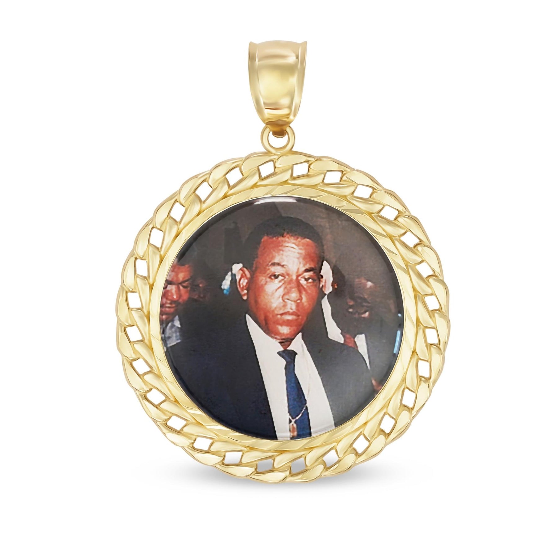 Studio shot of gold memorial pendant featuring a custom photo insert of a man.