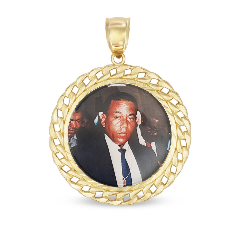 Studio shot of gold memorial pendant featuring a custom photo insert of a man.
