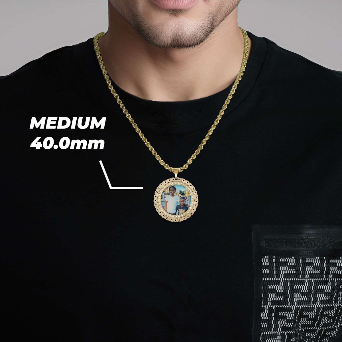 Man wearing a gold chain necklace with a medium 40.0mm round memorial pendant featuring a custom photo.