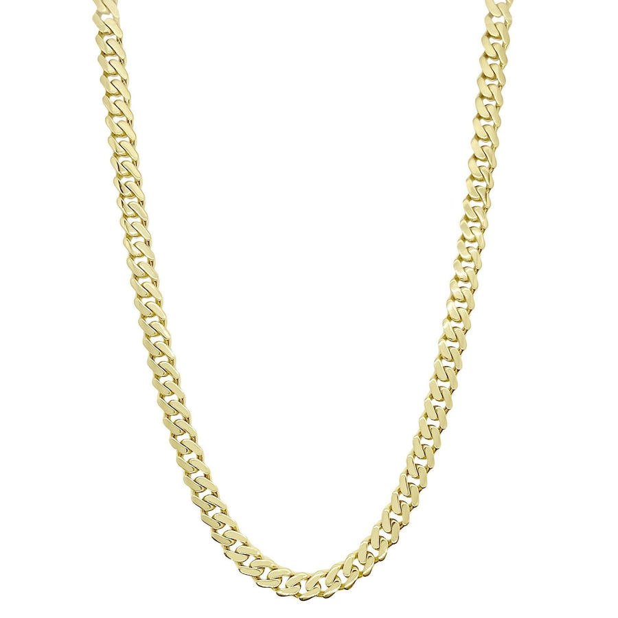 10k and 14k gold hollow Monaco Cuban link chain necklace on white background.