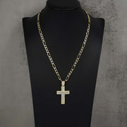 Gold crucifix cross pendant with pavé cubic zirconia, displayed on a black mannequin bust.