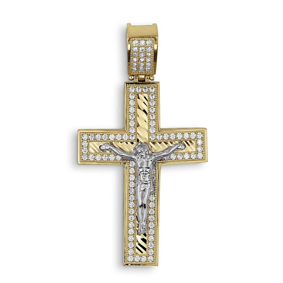 ellow and white gold crucifix pendant featuring cubic zirconia pavé stones on a white background.