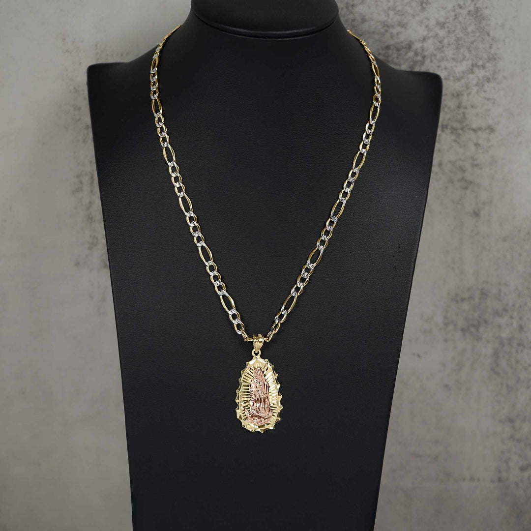 Gold Figaro chain with two-tone Guadalupe pendant, displayed on a black mannequin jewelry bust.