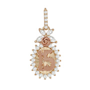 A rose gold 15th birthday pendant featuring a numbered '15' medallion and gemstone halo.