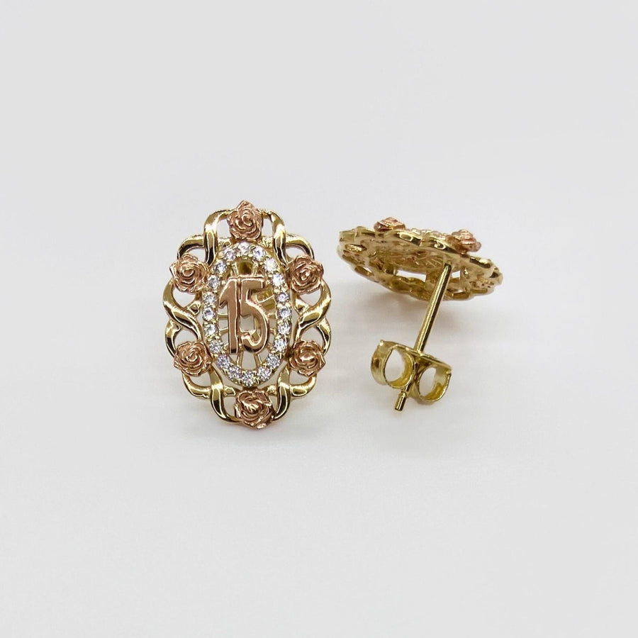 Tri-color gold Quinceanera stud earrings featuring a number 15 surrounded by rose accents.