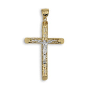 Two-tone caged gold crucifix pendant with a white gold Jesus on a white background.