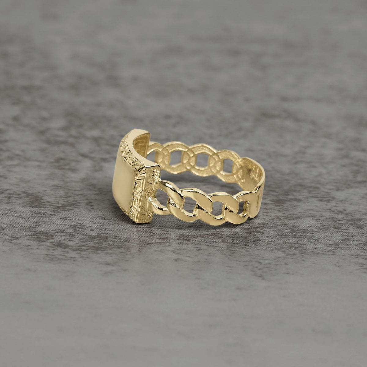 Solid 10k or 14k gold Cuban link ID ring featuring a Greek key pattern.
