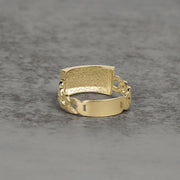 Solid gold Cuban link ID ring showcasing a hammered finish and smooth plate.