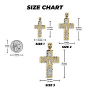 Size chart comparing three gold two-tone religious cross pendants to a US quarter